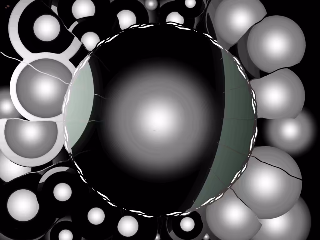 Schwarz-silbernes Mandala mit mehreren Kugeln in verschiedenen Größen – symbolisiert Ebenen und Ordnungen in der Kommunikation.